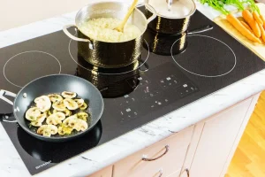 Cooking on best induction range with mushrooms and rice.