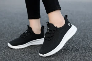 Black slip-on athletic sneakers