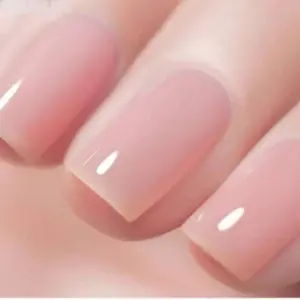 Short Summer Nails in a polished nude pink shade