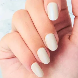Short Summer Nails in creamy beige with oval and squoval shapes