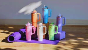 Target Stanley Cup tumblers in bright colors on yoga mat.