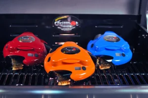 Top Grillbot reviews featuring robot cleaner on barbecue grill