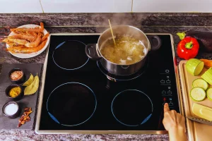  Cooking on best induction range with touch controls.