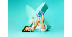 Smiling toddler in Rascal and Friends Diaper