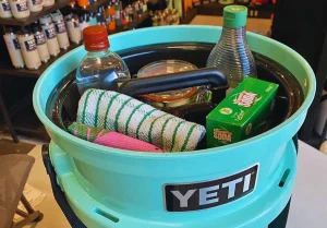 Yetis dishwasher safe bucket filled with cleaning items