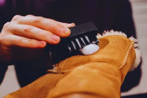 How to clean UGGs by brushing suede surface with care