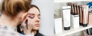 Makeup artist applying eye shadow on a woman