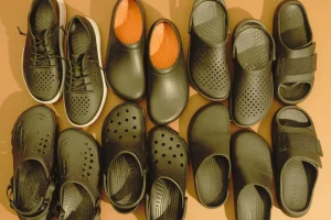 Variety of black Crocs Comfortable styles arranged 