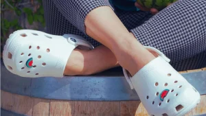Crocs Comfortable white clogs with charm.