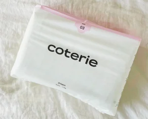 Coterie Diaper pack size 3 on white fabric