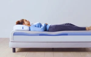 Woman sleeping comfortably on a Casper Mattress with contour support