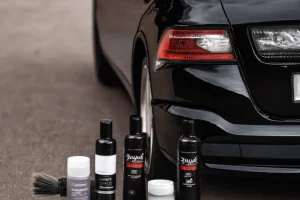 black sports car with black on black car paint