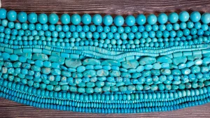 Various shapes and sizes of polished sleeping beauty turquoise
