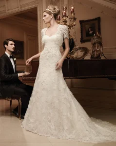 A bride wearing a beautiful lace wedding gown