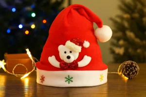 Cute red Christmas hat with teddy bear decoration