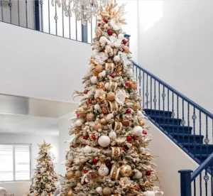 red and gold christmas tree with lights 