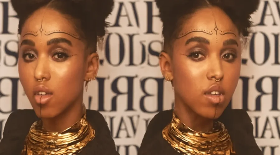 A gold septum piercing